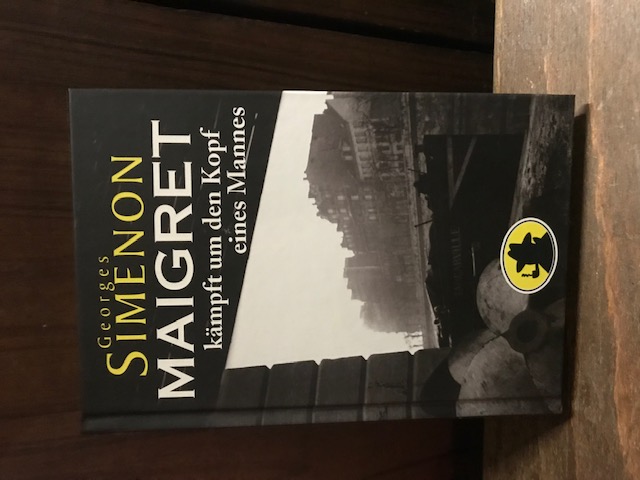 Maigret kämpft um den Kopf eines Mannes